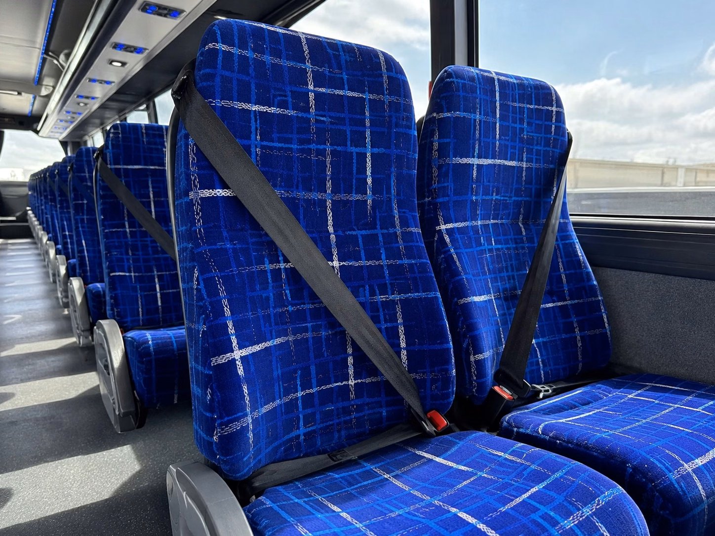 reading 56 passenger charter bus rental